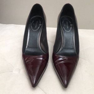 Prada patent leather “Made in Italy” pumps.